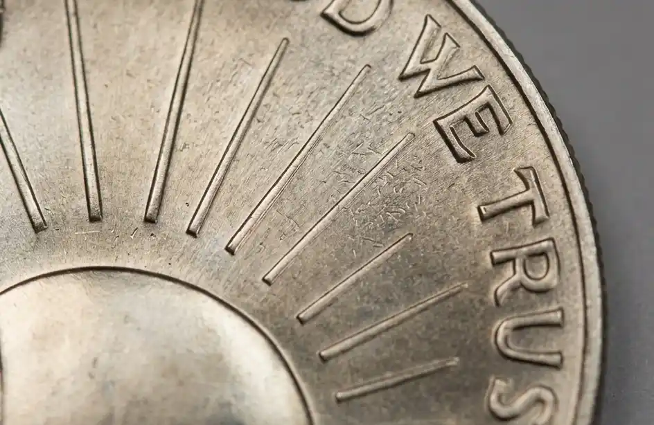 extreme close-up of 1986 Half Dollar surface highlighting engraving details